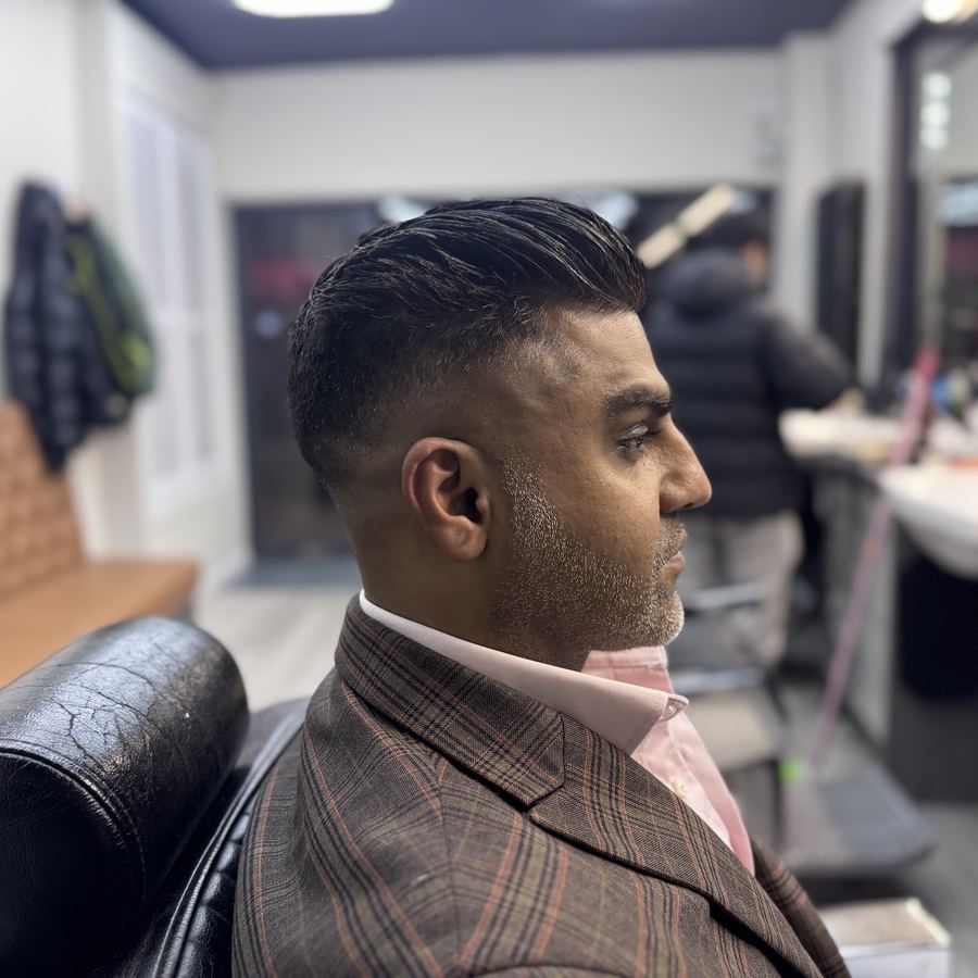Skin fade and styled top at Danny's Barber